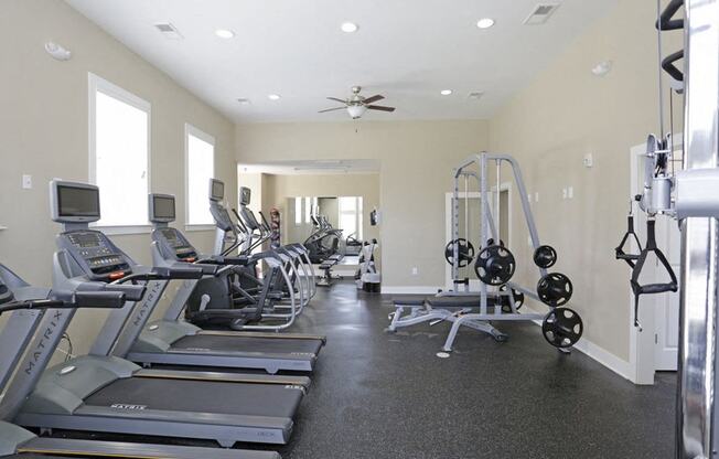 the residence apartments fitness room with cardio equipment