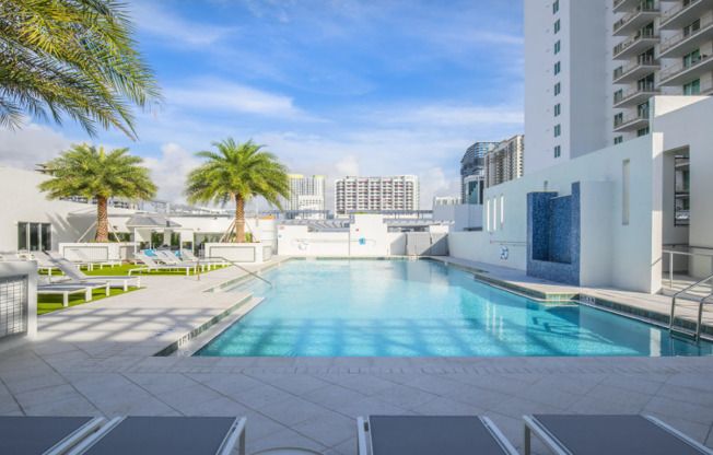 A rooftop pool atop apartments for rent near Miami Beach.