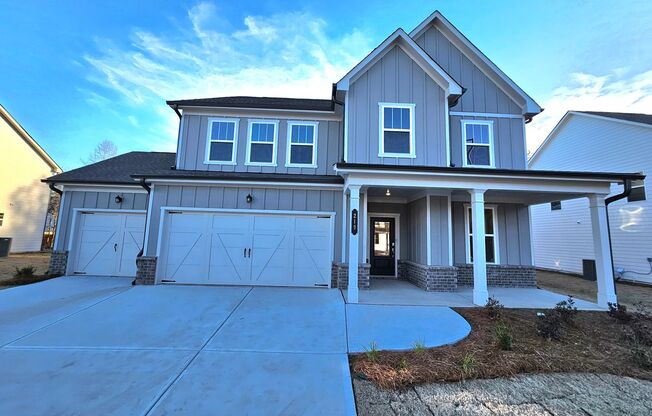 Incredible Farmhouse Style Home with Three Car Garage