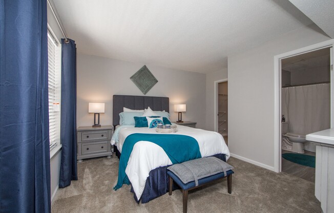 Natural lighting in master bedroom at St. Croix Apartments in Virginia Beach VA