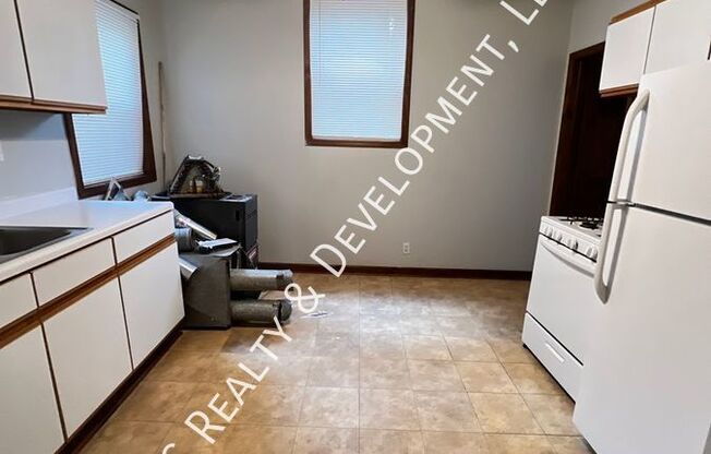 1113 1115 W PATTERSON AVE