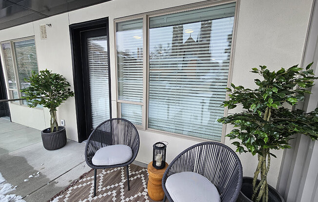 a patio with chairs at Lotus Republic Apartments for rent in Downtown Salt Lake City, Utah