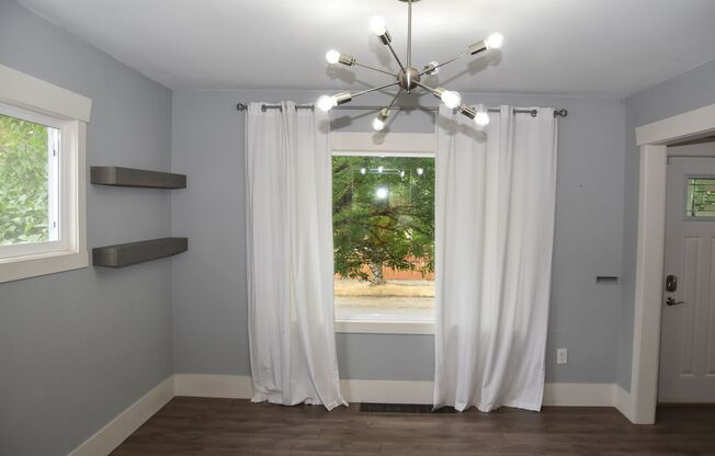 4 bedroom 4 Bath! Updated Kitchen and Bathrooms and Fully Finished Basement. With AC!