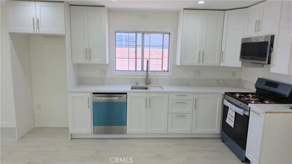 11623 PASO ROBLES AVE