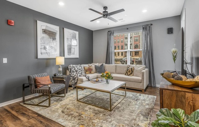 Unwind and Recharge in our Cozy Living Rooms. at Meeder Flats Apartment Homes, Cranberry Township, Pennsylvania