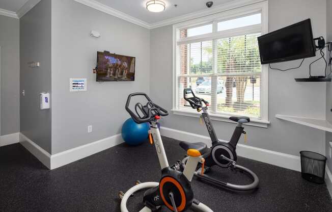 Free Weights And Cardio Equipment at Abberly Village Apartment Homes by HHHunt, West Columbia