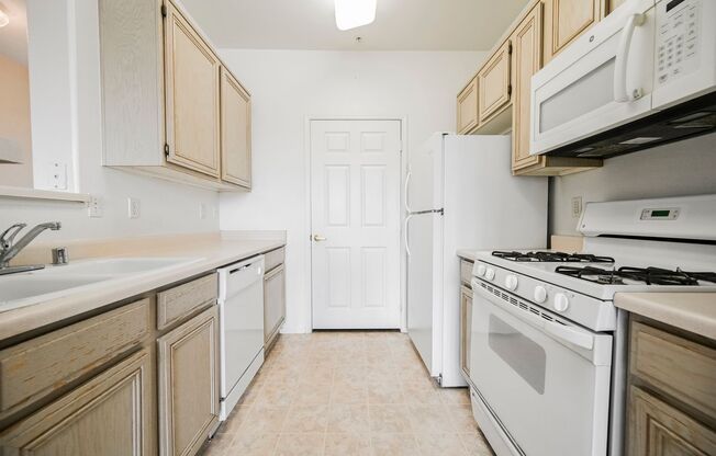 Spectacular Two Bedroom Condo Located In A Gated Community With Sparkling Amenities!