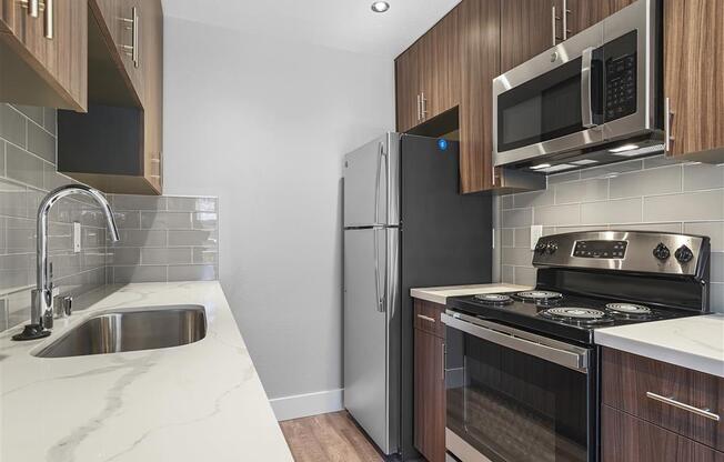 Efficient Appliances In Kitchen at Peninsula Pines Apartments, South San Francisco