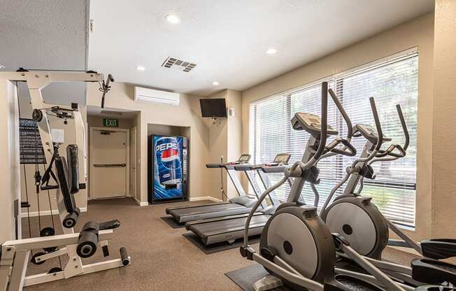 Ashford Park fitness center with cardio and weight equipment