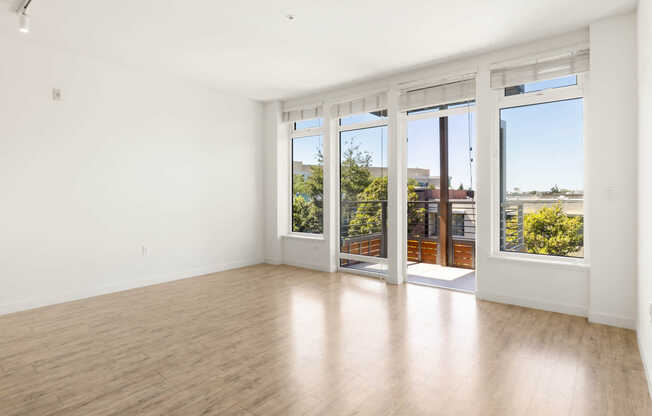 Living Room with Balcony and Hard Surface Flooring