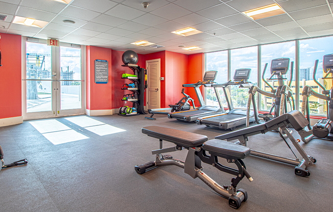 Reimagined fitness center with city views.