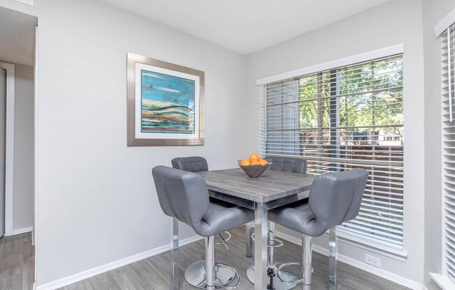 a chair sitting in front of a window