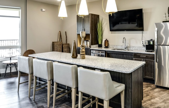 Community recreation room kitchen at AXIS apartments in Papillion, NE