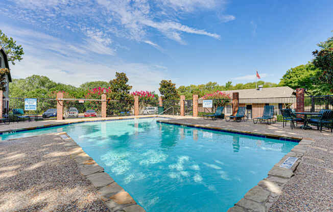 main pool with lounge chairs  at Arbors Of Cleburne, Cleburne
