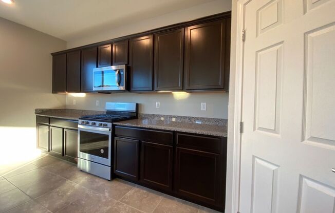 4 BED 2.5 BATH 2 CAR GARAGE,  LARGE CORNER LOT, GATED COMMUNITY IN NORTH VEGAS.