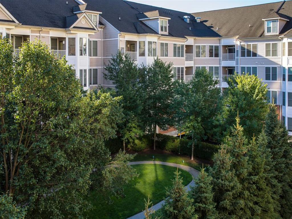 4th story shot of winding pathway on green grass, at Prospect Place, NJ