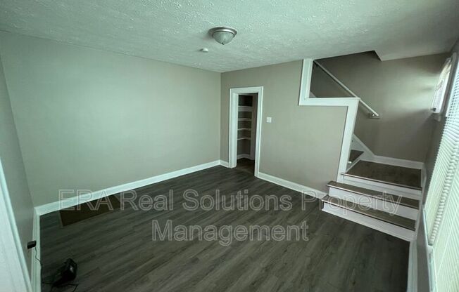 1516 E 26 AVE