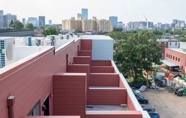 a view of the city from the roof of a building