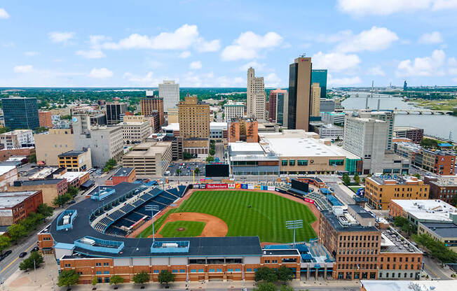 an aerial view of a baseball stadium in the city