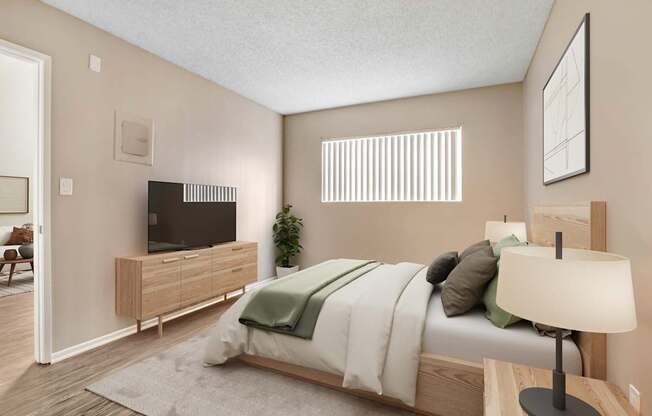 A bedroom with a bed, nightstand, and a television.