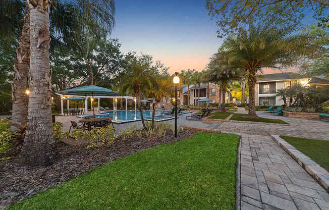 Community Swimming Pool and Landscape at Grand Pavilion Apartments in Tampa, FL.