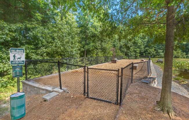 our apartments showcase a dog park with kennels