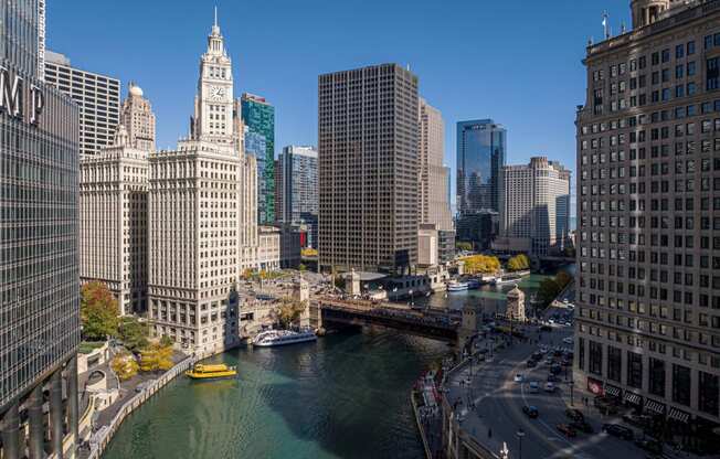 a view of the river in a city with tall buildings