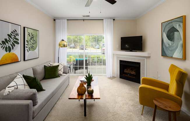 living room at the enclave at woodbridge apartments in sugar land, tx