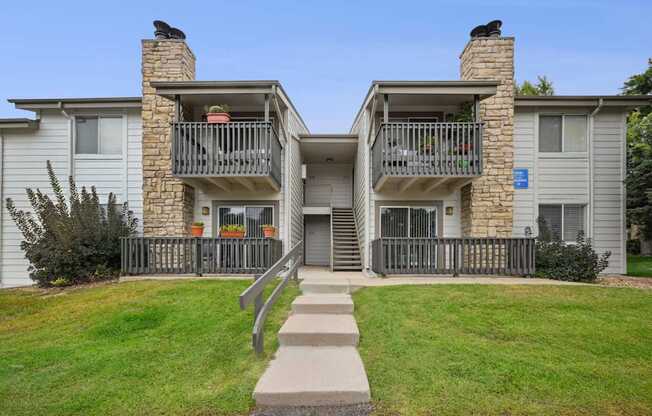 Reflections at Cherry Creek in Aurora, CO Stairs leading up to the apartment buildings