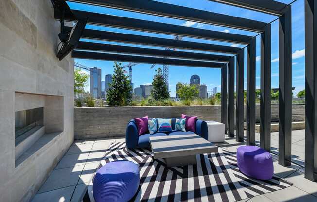 Rooftop Poolside seating with Downtown Dallas View