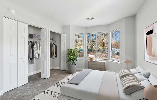 A bedroom with a large bed and a wardrobe.