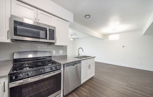 Renovated Kitchen with Stainless Steel Appliances at The Crossings Apartments, Grand Rapids, Michigan