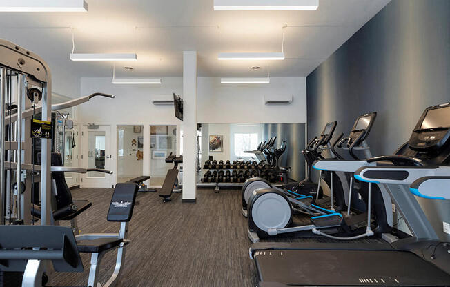 Fitness center with machines, free weights and state of the art lifting stations at Waterstone Place in Minnetonka, MN 55305