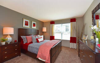 Bedroom interior with cozy bed at The Metropolitan, Kentucky