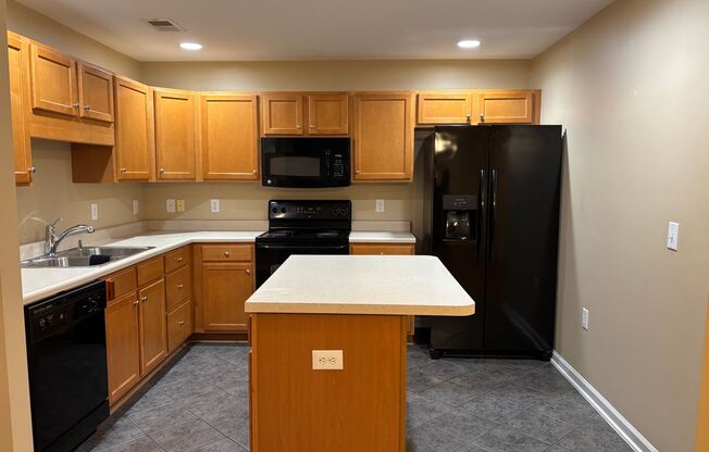 Second Floor Unit in Western Guilford District with Elevator Access