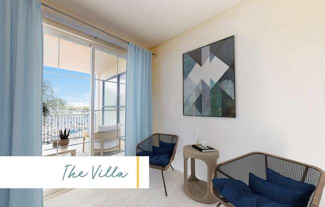 A living room with a large window, a sofa, a chair, and a table with a plant on it at Marina Harbor, California, 90292