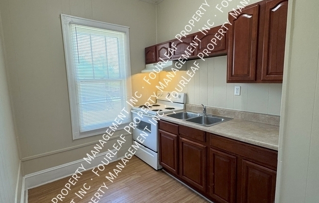 3212 E 5 AVE