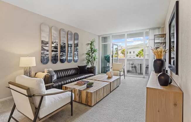 Living Room With Balcony at Towers at Costa Verde Apartments, San Diego, CA, 92122