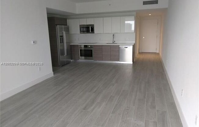 2 beds, 2 baths, 933 sqft, $3,750, Unit 1010 SW 2nd Ave # 1901 -