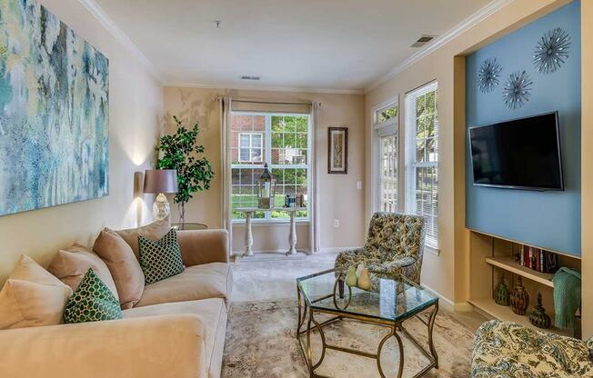 a living room with a couch and a television