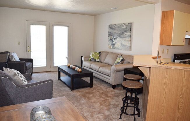 Carpeted Living Room at Huntington Cove Apartments, Indiana, 46410