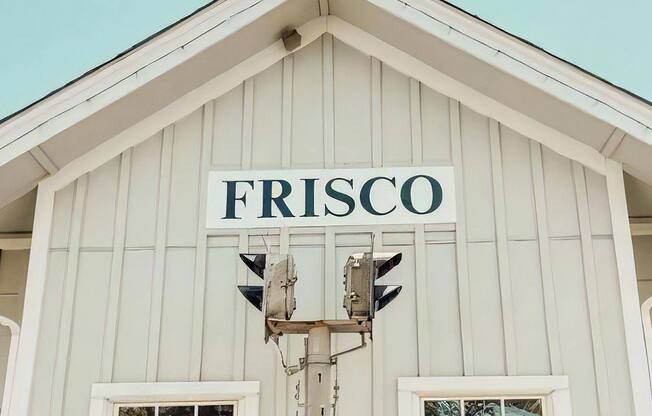 Building with Frisco Sign