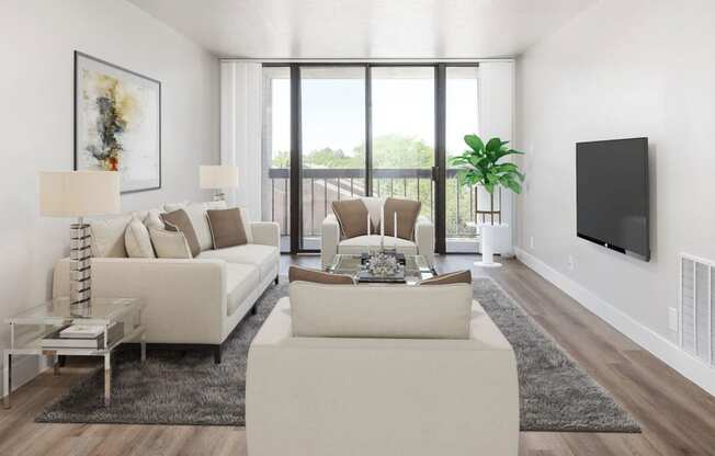 Furnished living room with large sliding glass doors, wood style floors, and tall ceilings