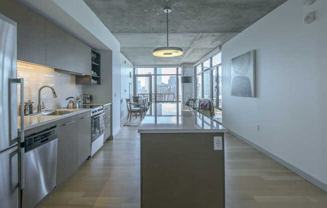 Open Kitchen with Expansive Island and Quartz Countertops