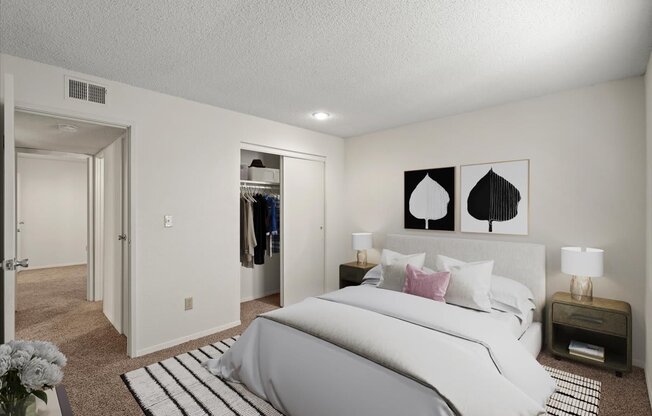 a bedroom with a bed and a closet