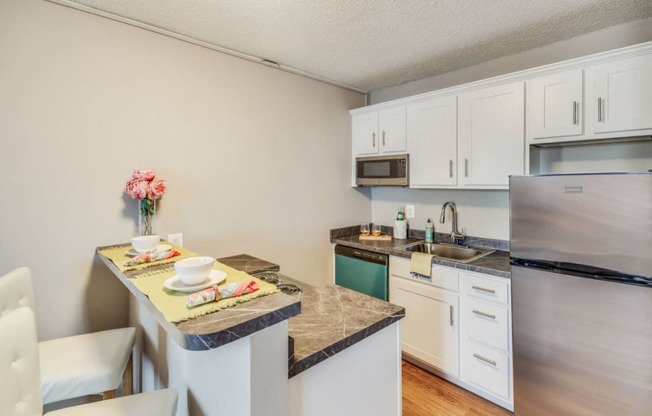 Renovated studio kitchen (staged) at Palisades, Washington, Washington