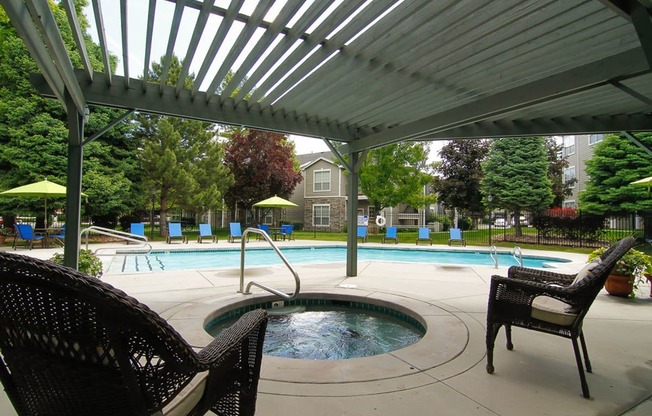 Outdoor Pool With Hot Tub Open Year-Round at Pinehurst Apartments, Midvale, Utah