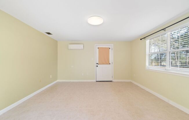 Introducing this Delightful 2 Bed/1 Bath, Nestled on a Generous Lot!