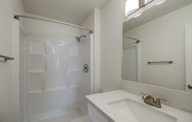 a bathroom with a sink and a bathtub