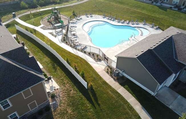 a view of the pool from the roof of a house